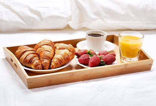 nhow Lima Room Breakfast Bed Tray Croissant Juice Strawberries 2500x17051 1